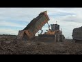 extreme skill operator mighty machines komatsu d50p push dirt dump truck stuck push out