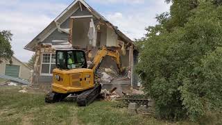 Caterpillar Cat 305 Mini Excavator destroys house