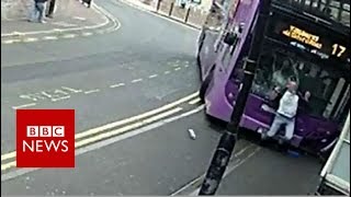 CCTV footage shows man hit by bus in Reading - BBC News