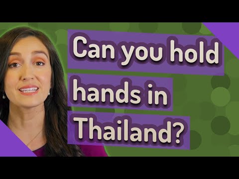 Do Thai people hold hands?