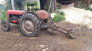 Vintage Thursday. Ferguson linkage winch pulling trees.