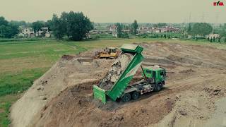 Extreme tipping in China - 100's tippers in action Genlvon trucks