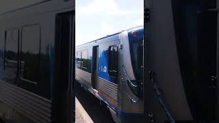 Miami Metrorail: Palmetto bound Green line train arriving at Martin Luther King Jr.