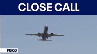 Investigation continues after close call at Reagan National Airport