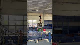 Kip-cast straddle to handstand on bars