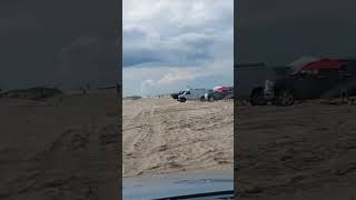 Point crossing drive on beach Cape Henlopen. Heading out for surf fishing.