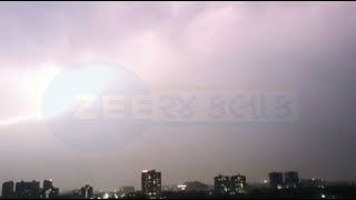 Amid unseasonal rain, massive lightning strike caught on cam in Ahmedabad | Zee News