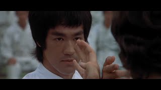 Bruce Lee teaches how to fight in Enter the Dragon (1973)  “With emotional content, not anger”