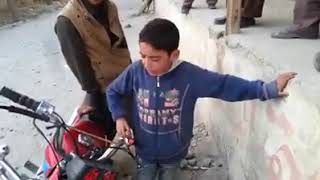 Talented Balti Boy singing a song related to the society of Baltistan .