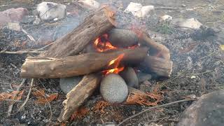 Heating Lava Rocks in the Fire to Make Acorn Flour - Wild Willpower PAC