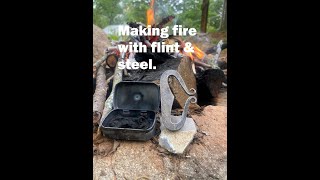 Making Fire with flint and steel.