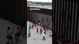 They made a seesaw at the border wall of U.S. and Mexico so the kids could play