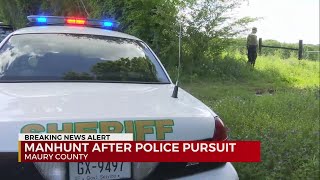 Manhunt after police pursuit