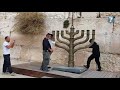 giant hannukah menorah set up at western wall