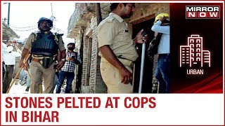 Stones pelted at Bihar police officers for raiding illegal liquor shop