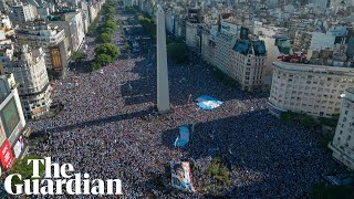 Drone captures sea of fans celebrating in Buenos Aires after Argentina's World Cup win – video
