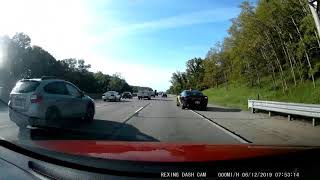 Speeding idiot bombing through traffic gets pulled over this morning