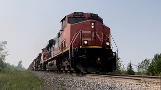 CN 2305 leads a daytime CN 450 Southbound out of Brechin, ON