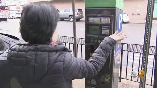 Workers Scramble To Fix NYC Parking Meters