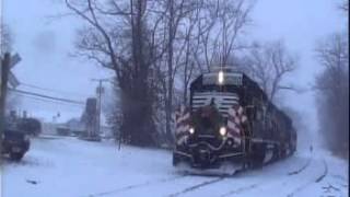 Conrail Santa Train dashing through the snow between Jamesburg,NJ and Freehold,NJ and back in Dec 14