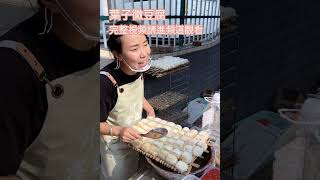 美女手氣真好選的這板黴豆腐多了二塊