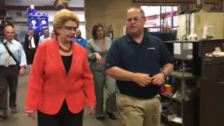 Harsco Ludington Plant Manager Alex Whitacre talks to Sen. Debbie Stabenow