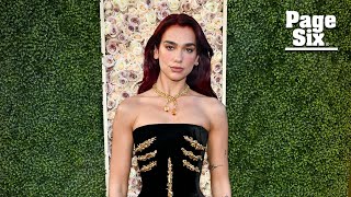 Dua Lipa is covered in glamorous gilded bones on Golden Globes 2024 red carpet