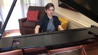 Don't Stop Me Now, by Queen, performed by teen pianist, Evan Brezicki.