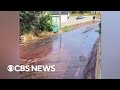 River of red wine flows through village in Portugal