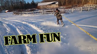 Snowboarding off the Back of the UTV