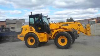 Фронтальный погрузчик с телескопической стрелой JCB TM300