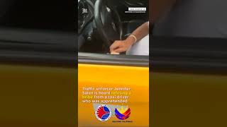 Traffic enforcer rejects motorist bribe on Carousel Bus Lane