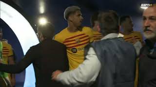 Barcelona players in the tunnel after Espanyol fans rushed the pitch.