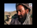 report on afghan police and local militia battling taliban