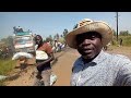 LC 5 of Nwoya district instruct the local people to offload and go with charcoal from the truck.