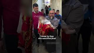 Palestinian mourns child killed by an Israeli attack in Gaza