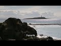 pladda lighthouse isle of arran sun glinting off the sea fremantle stock footage e19r29 103