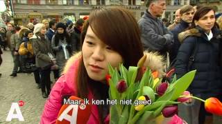 Lange rijen op Dam tijdens Nationale Tulpendag