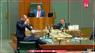 Australia's treasurer suffers from coughing fit during virus speech in parliament