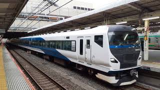 【特急湘南5号送り込み回送】E257系2000番台オオNA-09編成が回送列車として無表示でミュージックホーンを鳴らして大宮駅7番線から発車するシーン（回3174M）2024.07.02