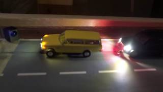 Faller Car System IR Car   Brekina Volvo 145 Yellow and Busch M CLass IR car car chase