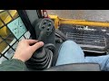 how to drive a cat skid steer for beginners