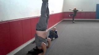 56 yr old does head stand