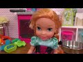 Elsa and Anna toddlers feed cute stuffed animal pets