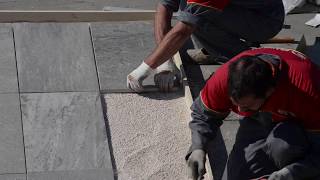 How to lay porcelain pavers over a gravel bed