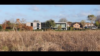 A tired and ugly bungalow extended into a contemporary luxury mansion.