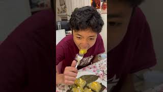 Francis eating his most favorite breakfast, Suman (Steamed Rice Cake) made by Grandma Ellen