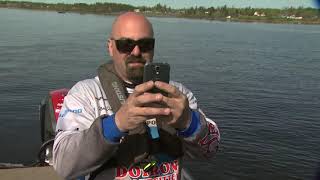 Host Rick Greene goes fishing for Striped Bass on the Miramichi River with Marc Doiron.