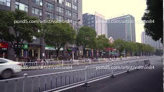 Shanghai, China - January 15, 2018: Typical scene of normal street in Shanghai China. On the road