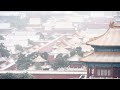 Stunning views of Beijing dusted by early winter flurries